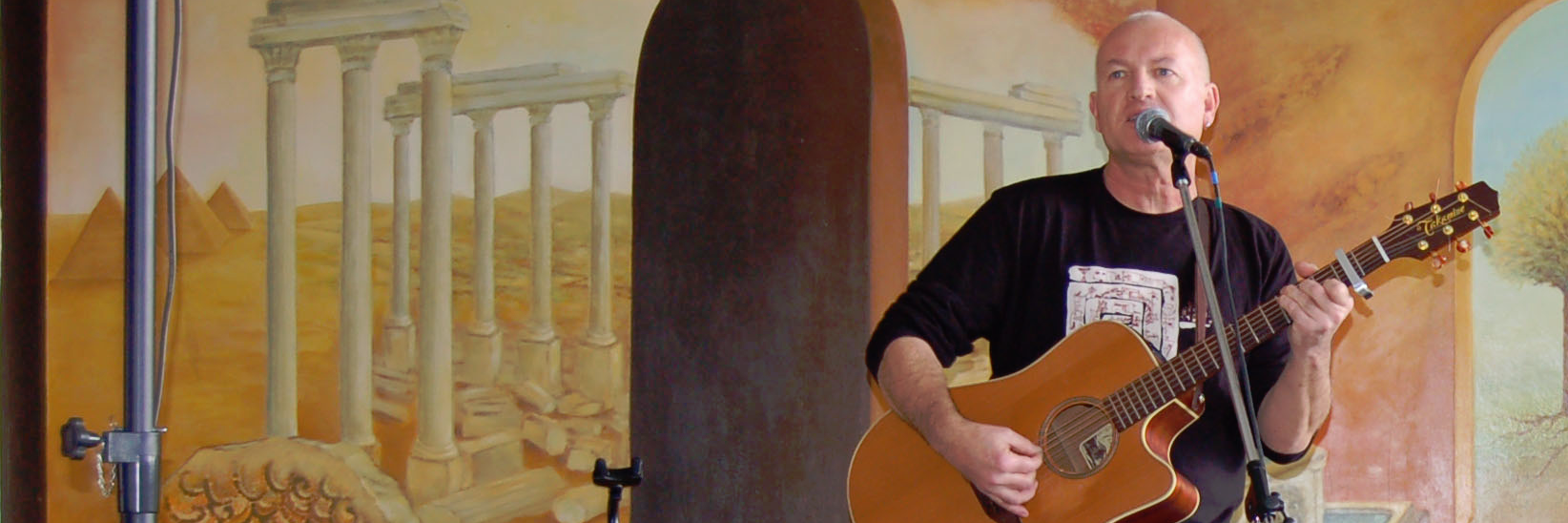 Jackie Oriol, musicien Guitariste en représentation à Rhône - photo de couverture